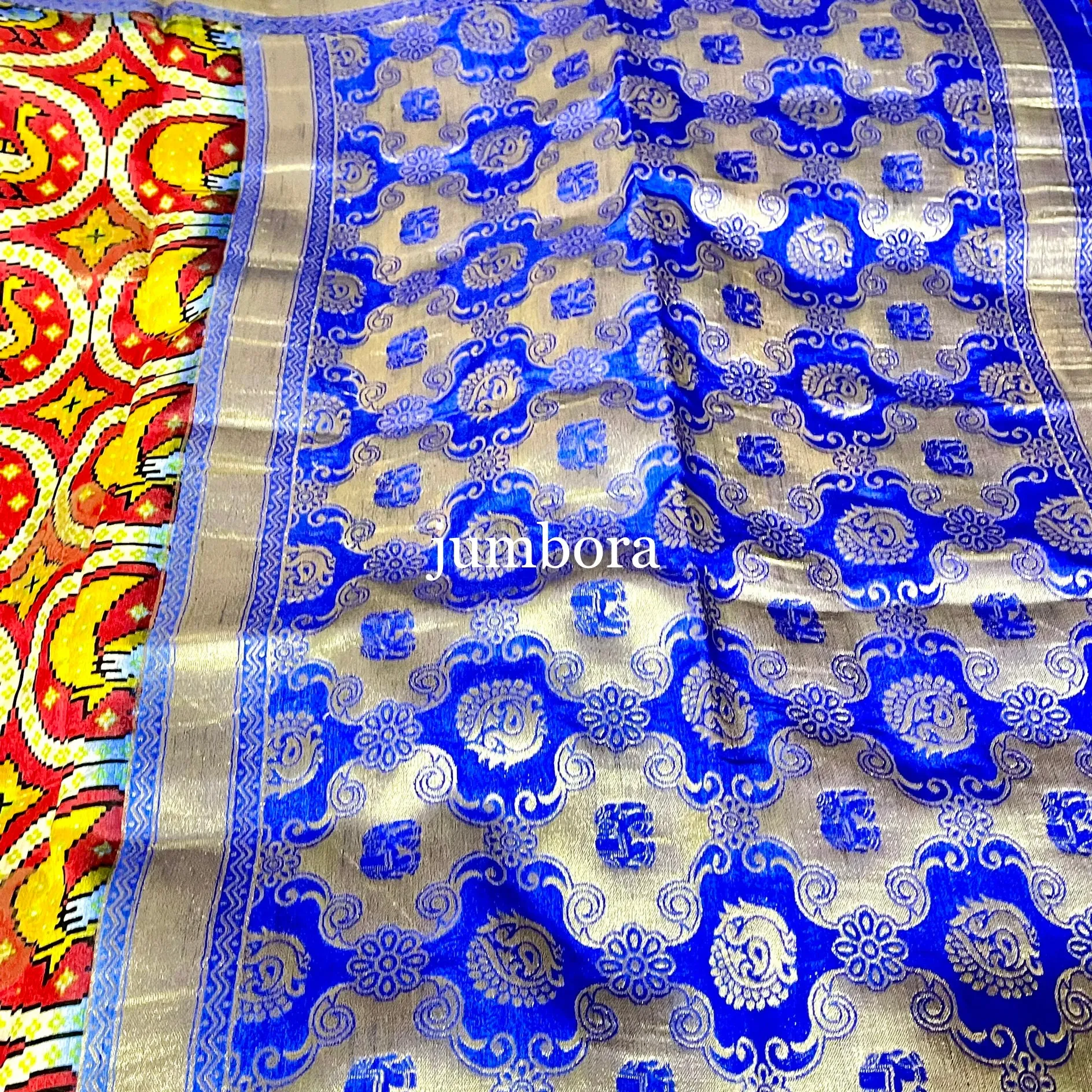 Kalamkari Style Red & Blue Banarasi Jute Silk Saree with stitched blouse