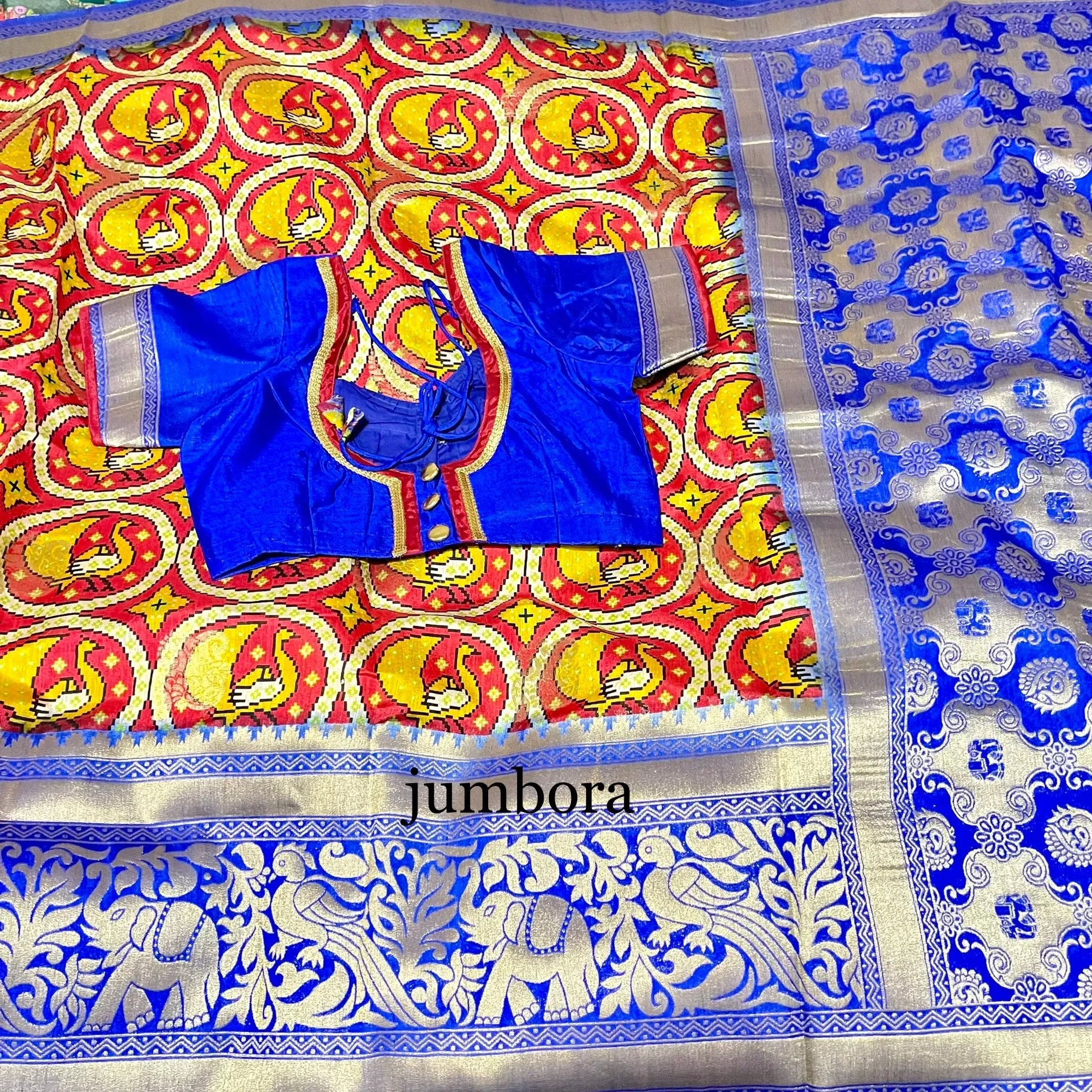 Kalamkari Style Red & Blue Banarasi Jute Silk Saree with stitched blouse