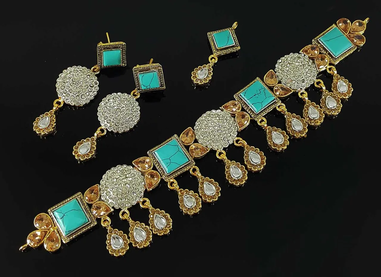 Peacock Style Jewelry in Golden base with multi-color precious stones